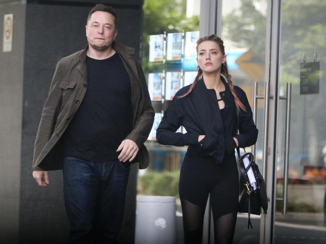 FOR ONLINE -  Amber Heard and Elon Musk pap.Amber Heard and Elon Musk pictured in Broadbeach then got into a car and went to the Movie World set.Picture: NIGEL HALLETT(Monday morning 10am)