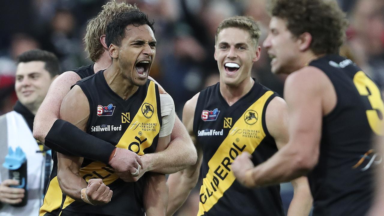 SANFL - GRAND FINAL  22/09/19 - Port Adelaide v Glenelg at Adelaide Oval. Marlon Motlop celebrates his goal late in the 4th  - with Carl Nicholson and Matthew Snook Picture SARAH REED