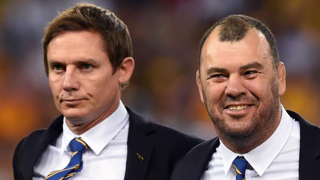 Michael Cheika (R) with Stephen Larkham.