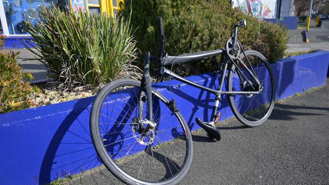 A cyclist has been rushed to hospital after colliding with a car on the intersection of Warwick Street and Harrington Street. Picture: Kenji Sato