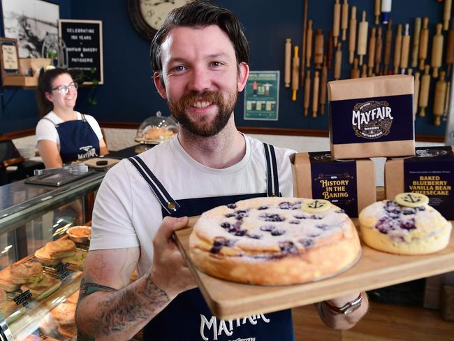 Phil Donnelly celebrates Mayfair Bakery's 150th anniversary with his Gluten Free Baked Blueberry Vanilla Bean Cheese Cake he's hoping to get into super markets watched staff member Ria Holman .Wednesday January 20,2021.Picture Mark Brake