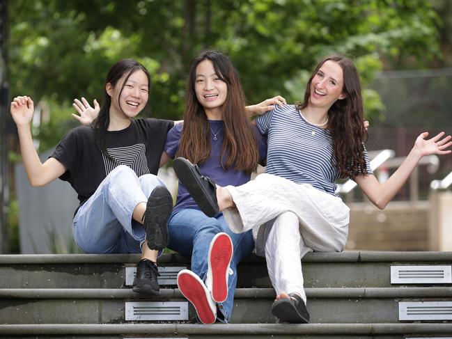 VCE results. Top MLC high achiever students Sophie Yang (Dux), Violet Zheng (Dux) and Natalya Kay (Dux secondus) celebrate the results at the college.                    Picture: David Caird