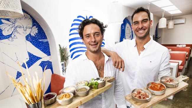 Champion ironman Matt Poole (right) with business partner Oliver Frost (left), with whom he opened a new restaurant called Maman in Burleigh Heads. Picture: NIGEL HALLETT