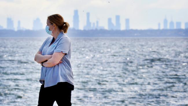 A walker out on the Frankston waterfront this morning. Picture: NCA NewsWire/Andrew Henshaw