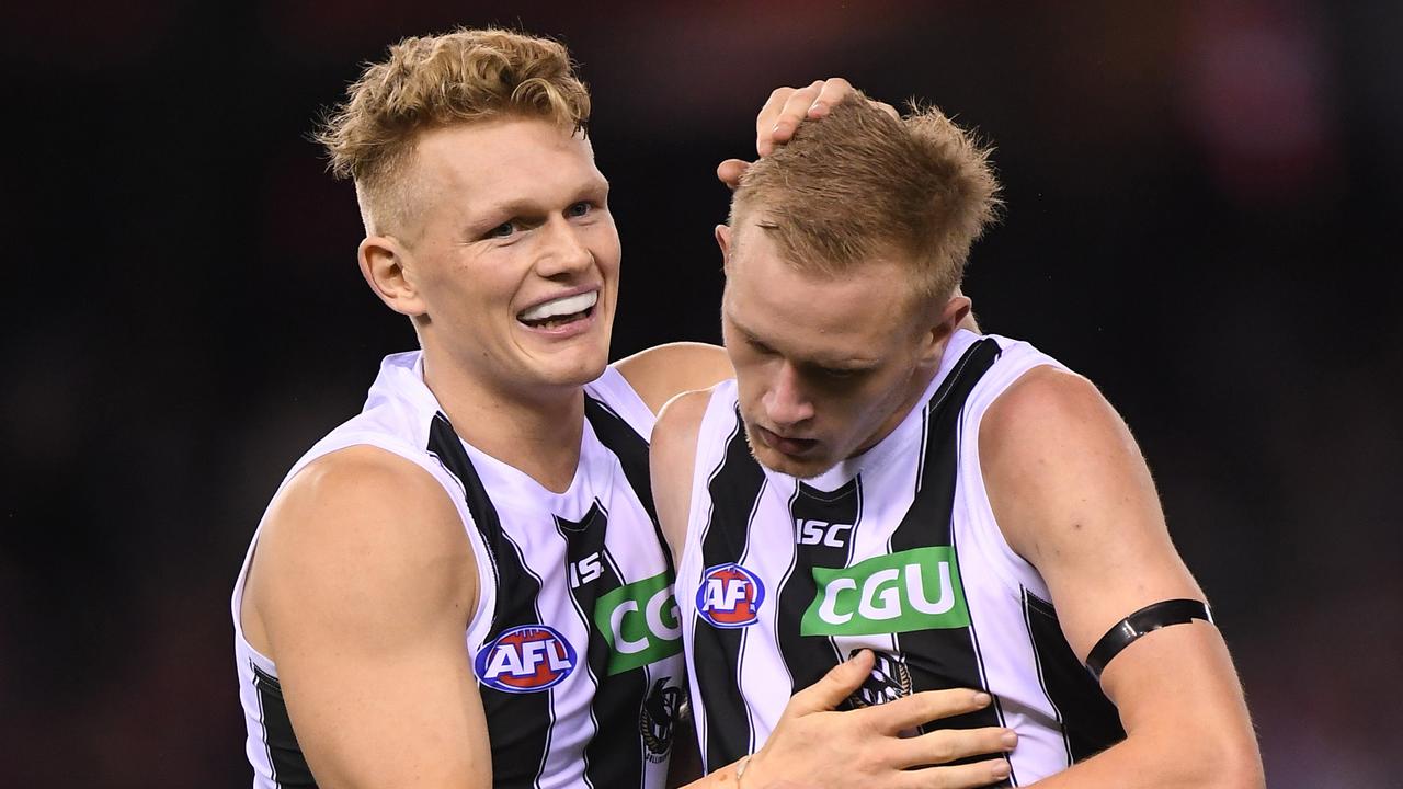 Adam Treloar (left) and Jaidyn Stephenson.