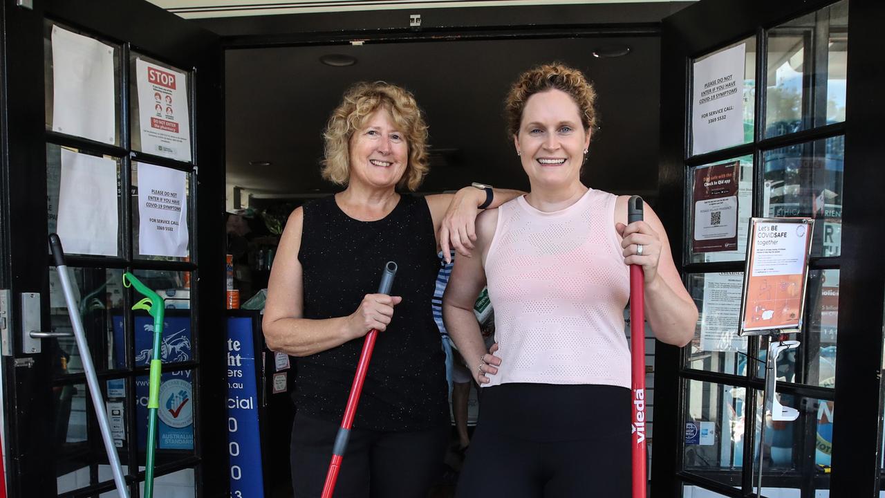 Rosalie Village Pharmacy’s Jill Kington alongside co-owner Naomi Bartlett as they clean up in the hope of reopening. Picture: Zak Simmonds