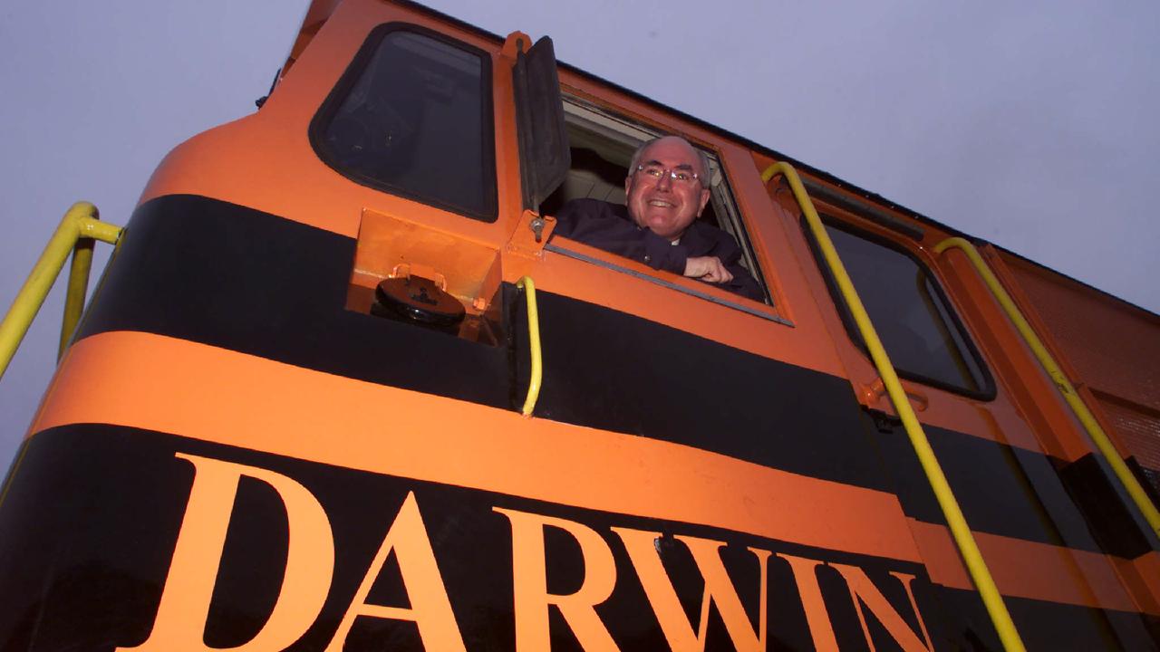 2001: Former prime minister John Howard aboard Ghan engine during official launch of Alice Springs-Darwin rail line