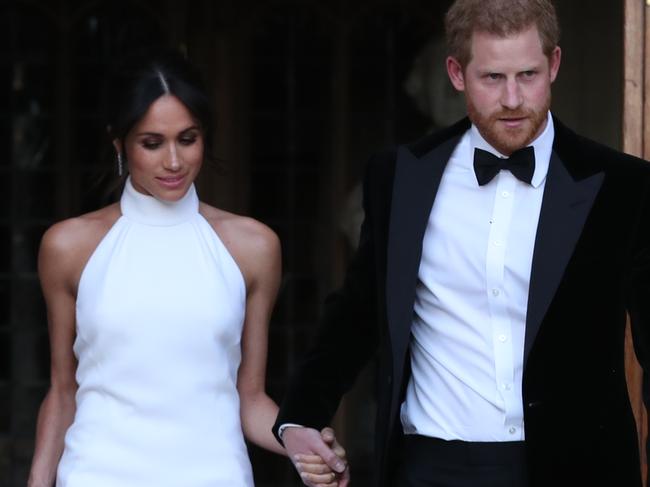 The newly married Duke and Duchess of Sussex, Meghan Markle and Prince Harry, leaving Windsor Castle after their wedding to attend an evening reception at Frogmore House, hosted by the Prince of Wales. The bride wore a ring which belonged to Diana, Princess of Wales. 19 May 2018 Pictured: newly married Duke and Duchess of Sussex, Meghan Markle and Prince Harry. Photo credit: Steve Parsons/WPA / MEGA  TheMegaAgency.com +1 888 505 6342