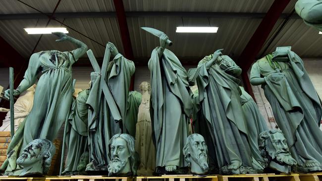 Statues which sat around the spire of the Notre-Dame cathedral in Paris, stored in SOCRA workshop before restoration.