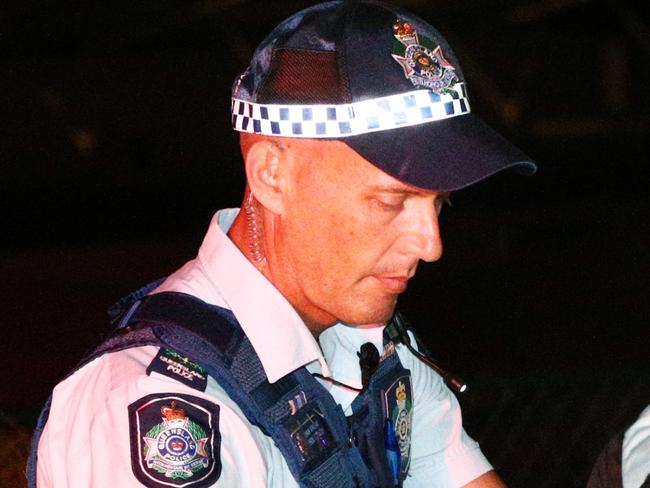 The Gold Coast Bulletin spends one night with Queensland Police District Duty Officer, Senior Sergeant Arron Ottaway. 2:40am - Senior Sergeant Arron Ottaway records the details of Finks outlaw motorcycle gang member Jamie Christopher Hooper at Nerang. Hooper was wearing a Mongols Motorcycle Club baseball cap. Picture: Radke Brendan