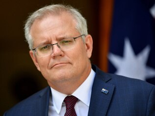 CANBERRA, AUSTRALIA - NOVEMBER 13:  Prime Minister Scott Morrison holds a news conference in the prime minister's courtyard on November 13, 2020 in Canberra, Australia. Morrison urged the national cabinet to reopen all of AustraliaÃ¢â¬â¢s state borders by Christmas as Covid-19 cases plummet, with only 12 newly diagnosed cases and 81 active cases nationally as of November 12. Additionally Victoria has achieved 14 consecutive days of no new cases being reported. (Photo by Sam Mooy/Getty Images)