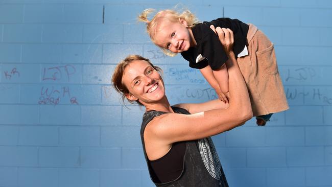 Nikki Hosking from Mt Lousia plays with her 20 mth old daughter Elwood at Heatley Park. Picture: Shae Beplate.