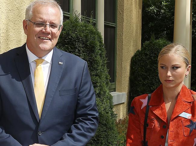 CANBERRA, AUSTRALIA NewsWire Photos JANUARY 25, 2022: Prime Minister Scott Morrison  with Grace Tame, who appeared to be uncomfortable with the meeting.The PM spoke with at the 2022 Australian of the Year Finalists Morning Tea, at the Lodge in Canberra.Picture: NCA NewsWire / Gary Ramage