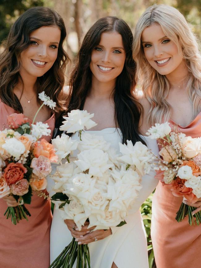 Stunning bride Kate with her “maids of honour”, Amy (left) and Sophie. Picture: Meaghan Coles