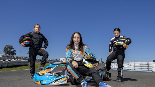 Up and coming go-kart drivers Kyla Tong, 16, Aiva Anagnostiadis, 14 and Sienna Bua, 9, are part of the Girls on Track program. Picture: NCA NewsWire / David Geraghty