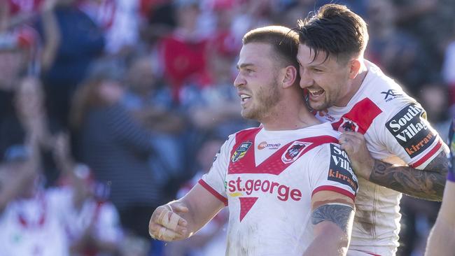 Euan Aitken celebrates one of his two tries with Gareth Widdop.