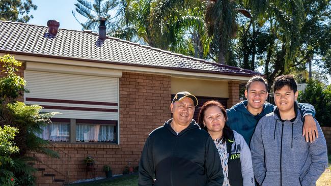 Nichole and Peter Makene with their sons Zintori, 16 and Tat, 13 have made significant savings by refinancing their home loan on their four-bedroom Sydney property. Picture: Monique Harmer.