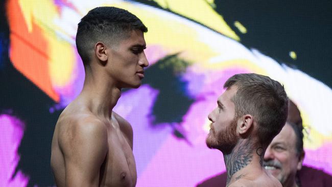 Fundora (left) towers over Australian Daniel Lewis, who beat Tim Tszyu as an amateur. Picture: AFP