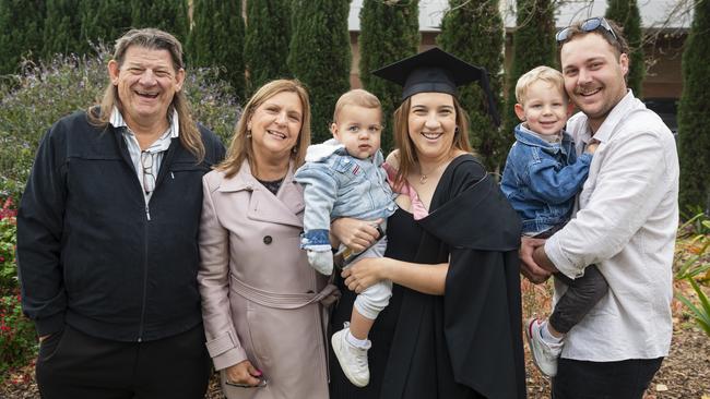 Bachelor of Education (Primary) graduate Ashleigh Allen with (from left) Damien Allen, Monique Allen, Peyton Martin, Reuben Martin and Kyle Martin at a UniSQ graduation ceremony at The Empire, Tuesday, June 25, 2024. Picture: Kevin Farmer