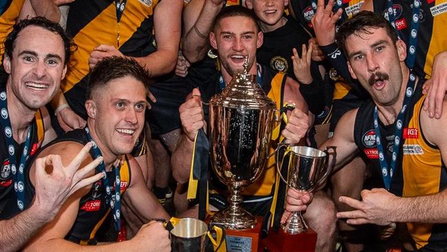 Heidelberg players celebrate their premiership clean sweep. Picture: Field of View Photography