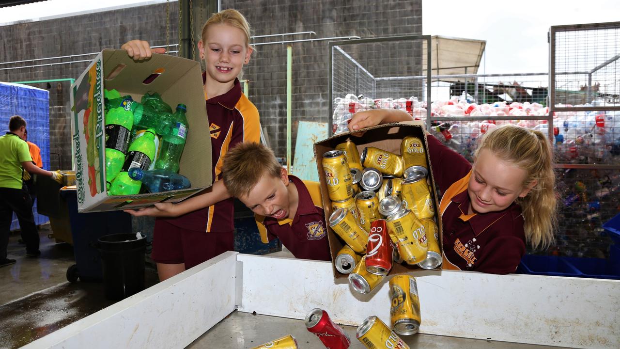 Edge Hill State School students Abby, Ben and Hannah Bissett deposit bottles and cans at North Queensland Recycling Agents in Bungalow. Picture: Peter Carruthers
