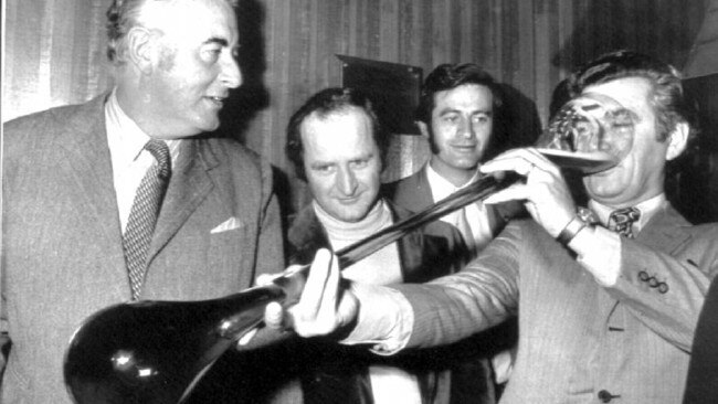 Bob Hawke drinks from a yard glass with Gough Whitlam in the 1970s.