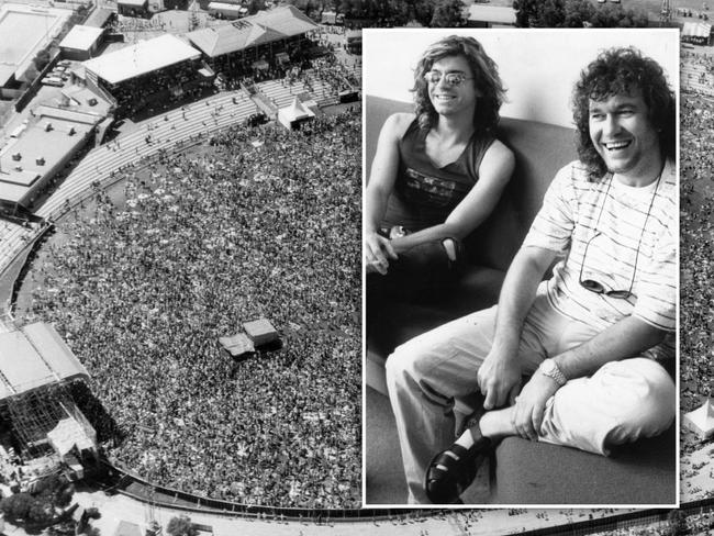 Rock singer Jimmy Barnes (r) and INXS lead singer Michael Hutchence over Thebarton Oval artwork.