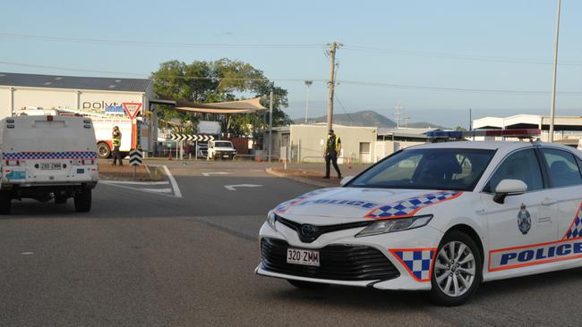 Police and fire crews at the scene of a crash on Woolcock St which left a motorbike rider in a serious condition.