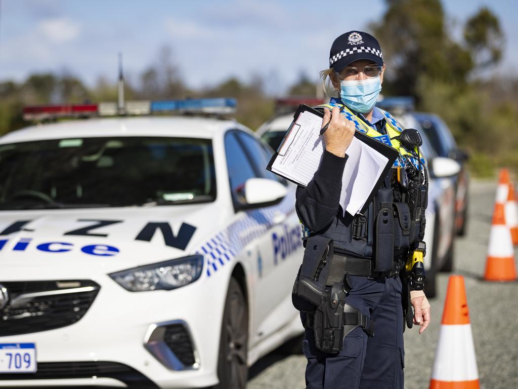 Police are stationed at border check point to ensure people stay in the Perth and Peel region unless they are exempt. Picture: Matt Jelonek/Getty Images