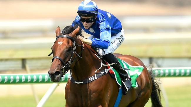 Jockey Justin Huxtable steers Smart Meteor to victory at Doomben. Picture: AAP