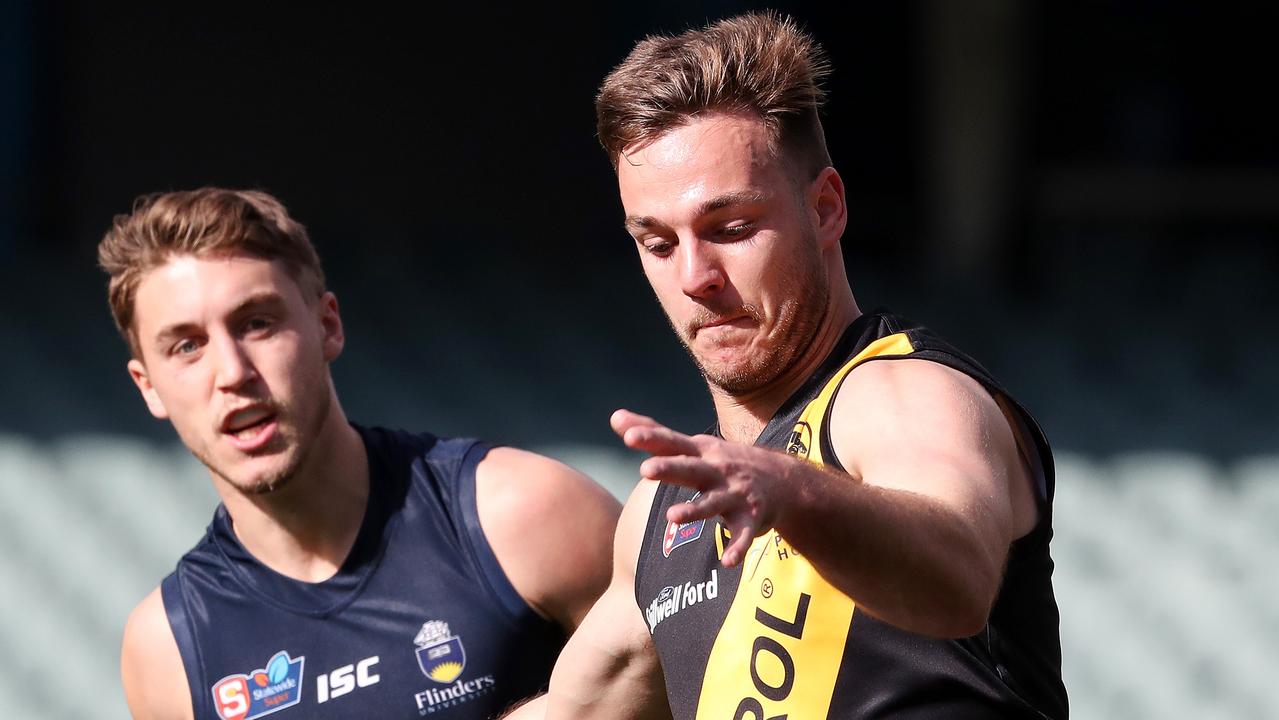 SANFL - Sunday, 5th July 2020 - Glenelg v South Adelaide at the Adelaide Oval. Tigers Cory Gregson gets his kick away from South Adelaide Thomas Highmore Picture: Sarah Reed