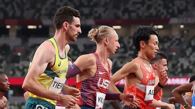 TOKYO, JAPAN - JULY 30: (L-R)  Patrick Tiernan of Team Australia, William Kincaid of Team USA and Akira Aizawa of Team Japan compete in the Men's 10,000m Final on day seven of the Tokyo 2020 Olympic Games at Olympic Stadium on July 30, 2021 in Tokyo, Japan. (Photo by Christian Petersen/Getty Images)