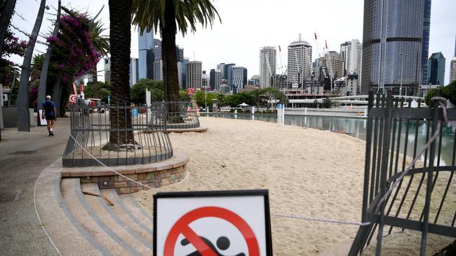 Popular public places in Brisbane like South Bank beach were deserted on Saturday as residents obeyed the state’s three-day lockdown. Picture: NCA NewsWire/Dan Peled