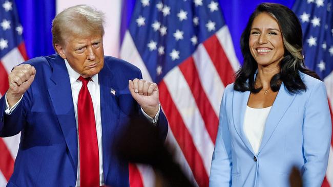 Donald Trump with Tulsi Gabbard during a campaign rally. Picture: AFP.