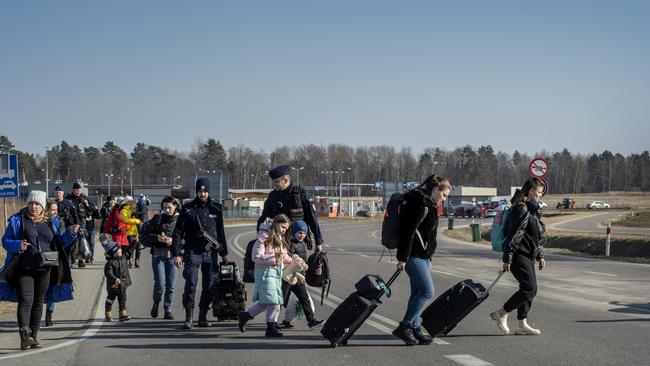 Refugees arrive at the Budomierz Border Crossing, Poland. Picture: Annabel Moeller