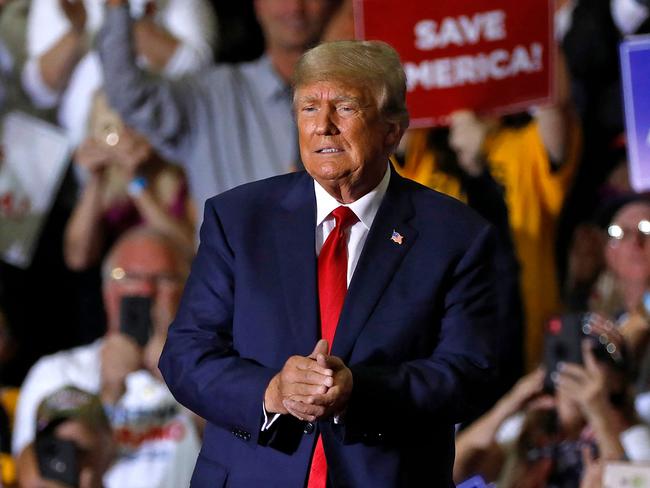 Former US President Donald Trump arrives for a Save America rally at Macomb County Community College Sports and Expo Center in Warren, Michigan, on October 1, 2022. (Photo by JEFF KOWALSKY / AFP)