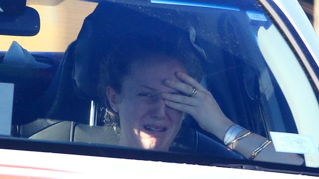 The distraught teenager at the scene this morning. Picture: Mark Stewart