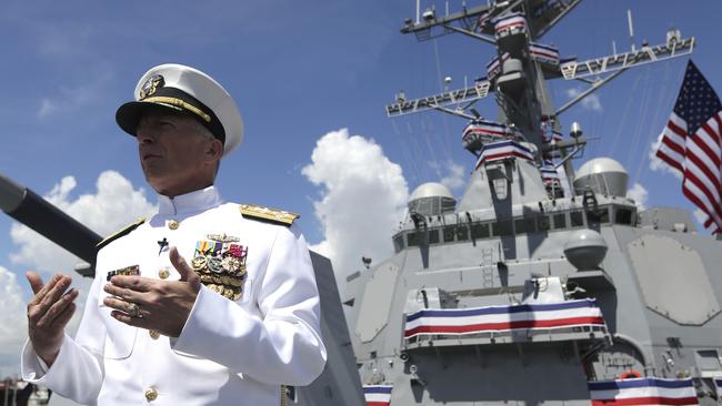 Admiral Craig Faller, commander of U.S. Southern Command, speaks with the news media following a commissioning ceremony for the U.S. Navy's guided missile destroyer, the USS Paul Ignatius, Saturday, July 27, 2019, at Port Everglades in Fort Lauderdale, Fla. (AP Photo/Lynne Sladky)