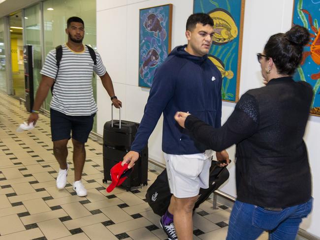 Brisbane Broncos NRL player David Fifita is greeted by his mother as he arrives at the Brisbane International Airport. (AAP Image/Glenn Hunt)