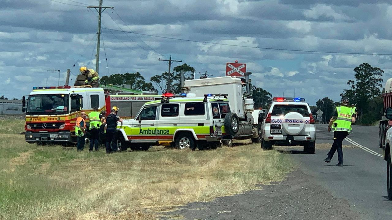TRUCK VS TRAIN: Emergency services rushed to reports a truck had smashed into a train on Jandowae Rd in Dalby. Picture: Sam Turner