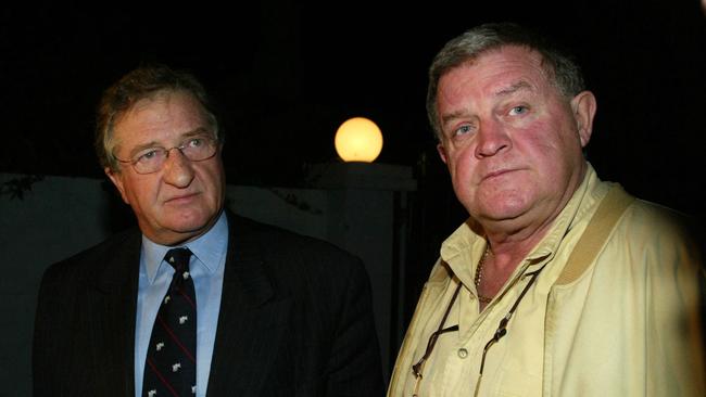 John Elliott and Bruce Mathieson speak to the media after a meeting at the home of Kevin Hall in Hawthorn.