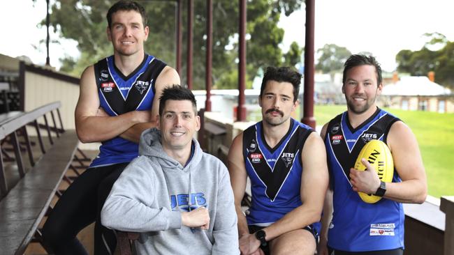 Kane Stewart (front) and players Anthony Skara and Daniel Caire (right) will not be at the Jets in 2021. Pictured in 2019 with co-captain Blake Harris (left). Picture: AAP /Dean Martin