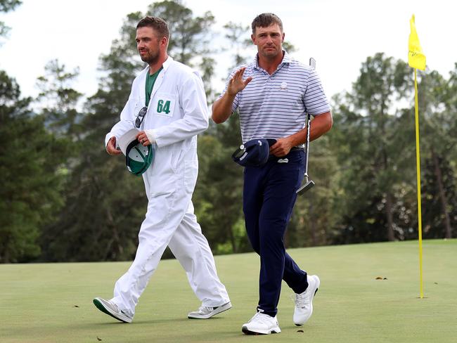 Bryson DeChambeau walks off the 18th green. Picture: Andrew Redington/Getty Images)