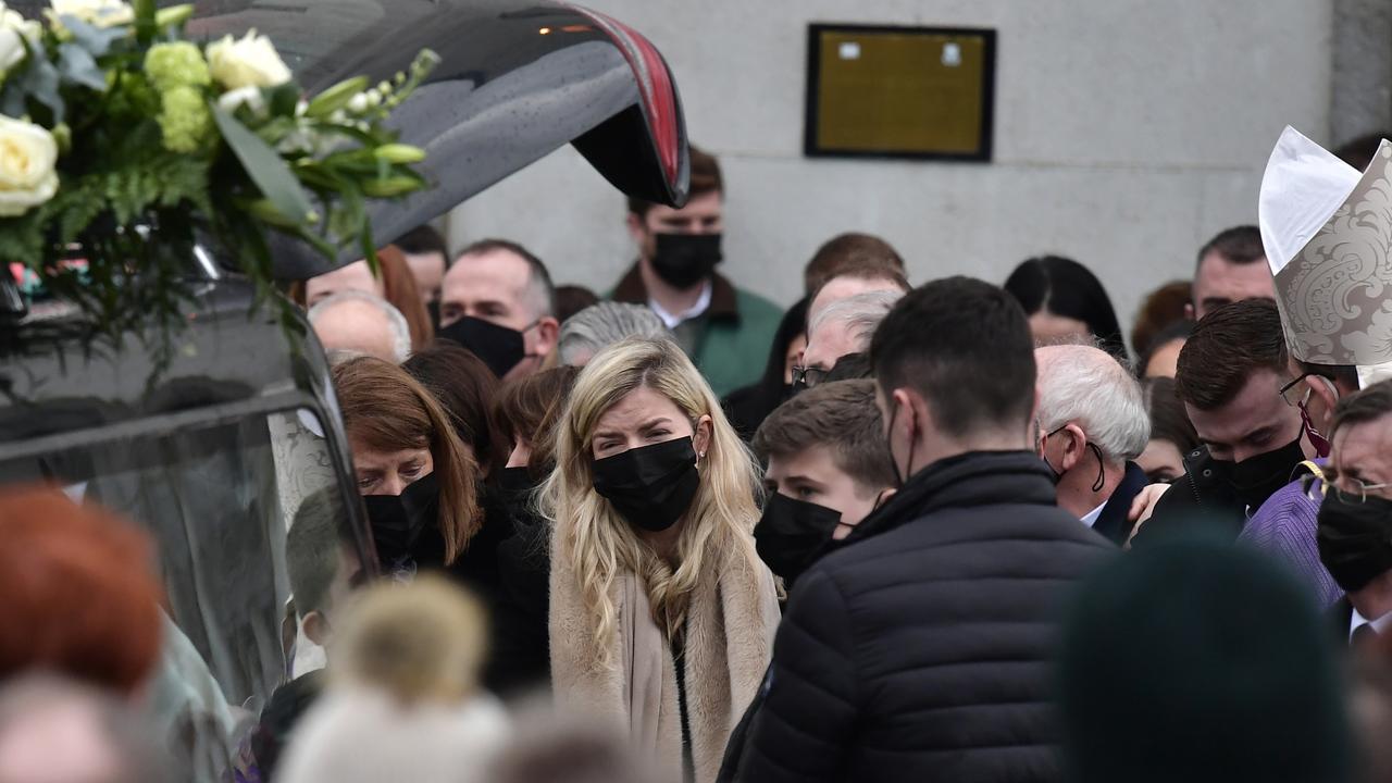 Ashling’s mum Kathleen Murphy and sister Amy Murphy as the hearse prepares to leave St Brigid’s Church, where Ms Murphy’s funeral was held. Picture: Charles McQuillan/Getty Images