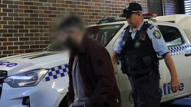 Brad McLeod, 33, of Newport, at Manly Police Station on Wednesday where he was chared with allegedly possessing and sharing child abuse material under Strike Force Trawler. Picture: NSW Police