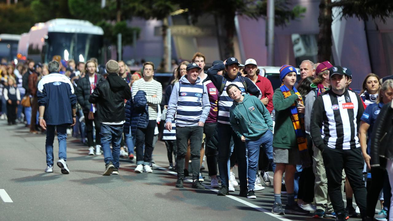 Crowds wait on Moorabool Street to enter the Polly Farmer gate to GMHBA stadium. Picture: Mike Dugdale