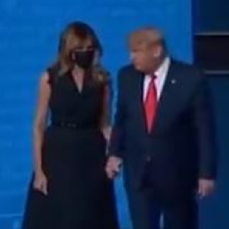 Twitter users have flooded the social media platform with clips showing US First Lady Melania Trump appearing to pull away from Donald Trump. Picture: Twitter