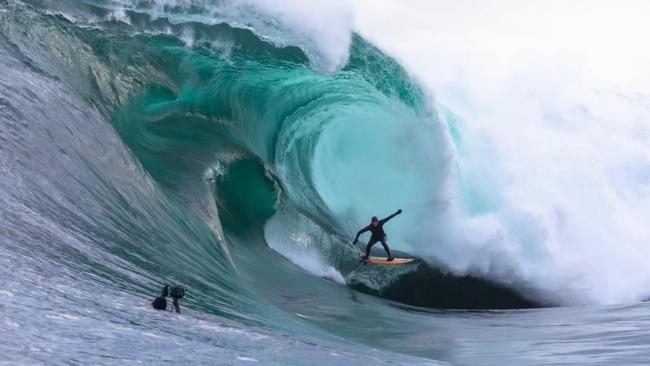 Lucy Nadebaum filming surfing friend Russell Bierke. Picture: Supplied