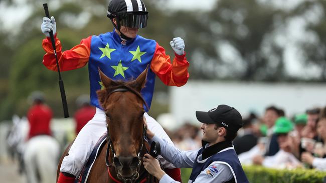 Craig Williams celebrates winning the Russell Balding Stakes aboard Bella Nipotina at Rosehill on Saturday. Photo: Jeremy Ng/Getty Images.