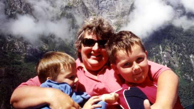 Leading Senior Constable Lynette Taylor with her two sons.